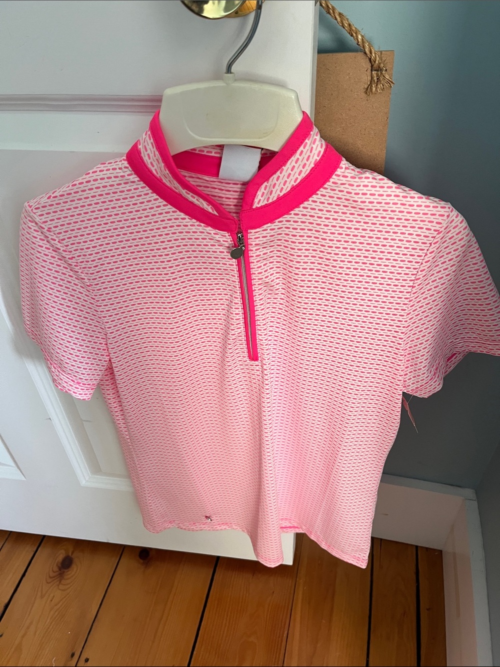 Daily Sports white Short-Sleeve Zip athletic top with Hot Pink Trim net